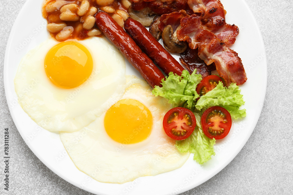 Delicious breakfast with sunny side up eggs on light table, top view Delicious breakfast with sunny side up eggs on light table, top view
