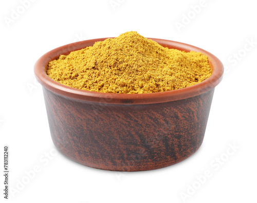 Curry powder in bowl isolated on white