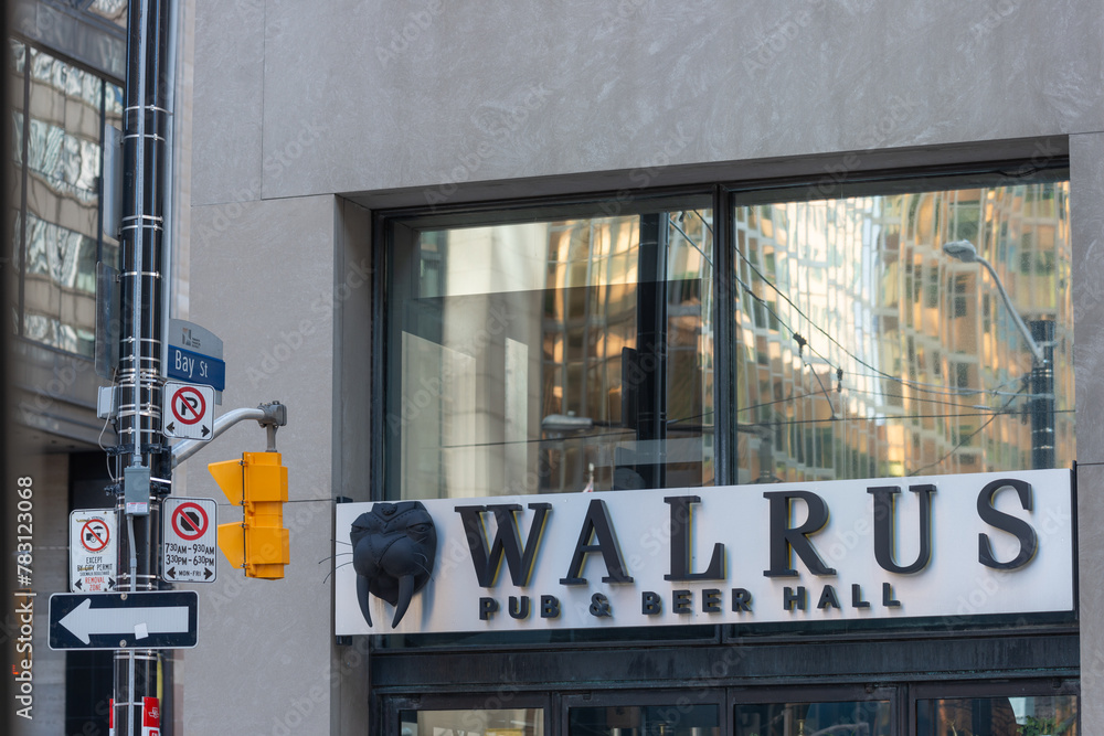 exterior building and sign of Walrus Pub & Beer Hall, a restaurant