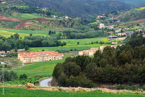 Scenic view of a field and houses in a village in Setif, Algeria.