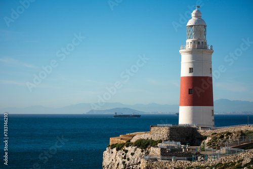 lighthouse at point europe in gibraltar, the southernmost point of europe, where you can appreciate the proximity of the african continent.
