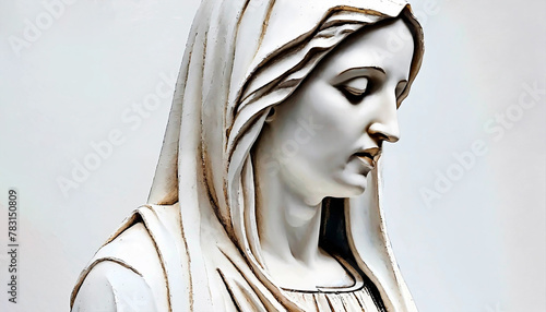Plaster statue of Mother of Jesus Mother Mary isolated on white background with copy space. Can be used as religious background. Portrait of sacred woman, mother of God. Concept of faith and purity.