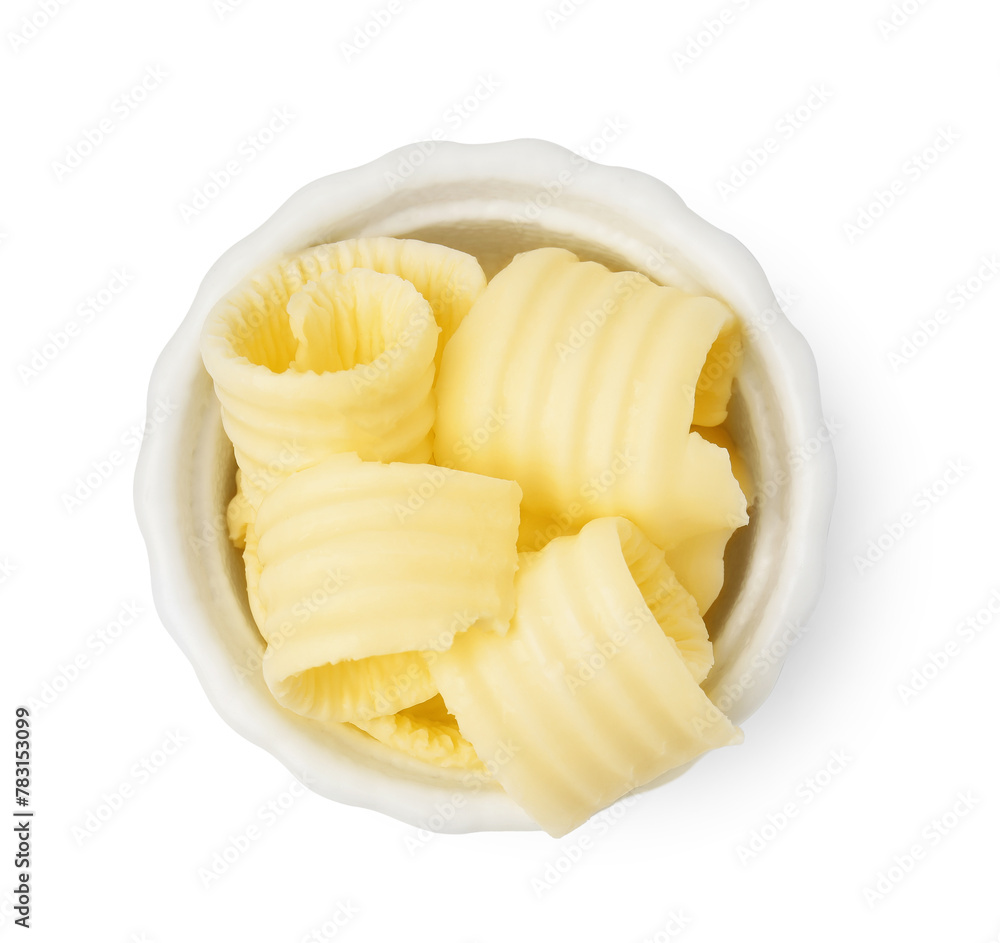 Tasty butter curls in bowl isolated on white, top view Tasty butter curls in bowl isolated on white, top view