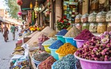 A retail market selling natural foods, spices, and flowers in a public space