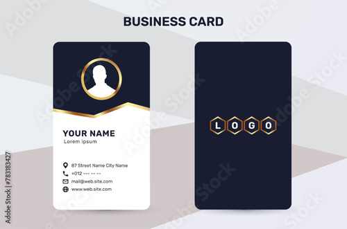 The business card uses a golden color accent to give a sense of luxury and premium quality. With a dark and white background, it has a simple and modern design that suits the corporate identity style
