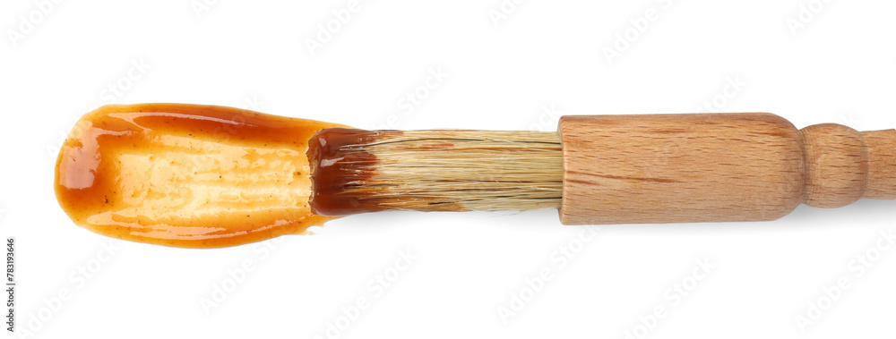 Brush with tasty barbecue sauce isolated on white, top view Brush with tasty barbecue sauce isolated on white, top view