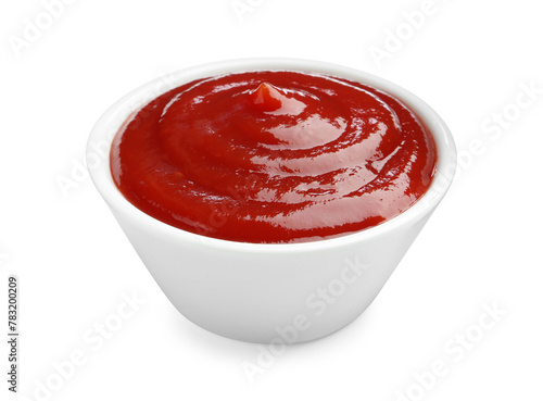 Tasty ketchup in bowl isolated on white. Tomato sauce