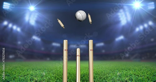 White Cricket Ball Bowled Out Stump Bails Impact 3D Animation under Stadium or Flood Light photo