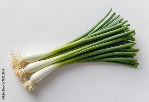 Fresh spring onion on isolated white background , juicy and fresh, top view, Flat lay, no shadows photo