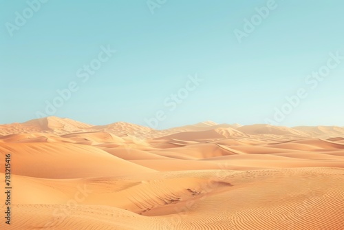 Abstract landscape of magnificent sandy dunes of desert land in soft warm sunlight with clear sky photo