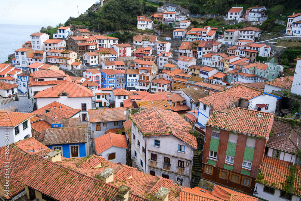 vast urban landscape filled with numerous buildings and houses in Cudillero, a traditional Asturian coastal town in Spain. 