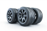 Car tires with rims on a white background