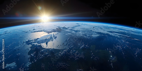 wide shot of the earth from space, blue horizon, black sky, bright sun in upper  © 思源 蒋