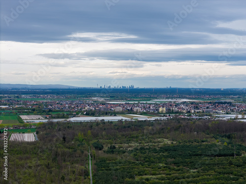 Frankfurt skyline behind fields and landscape in spring