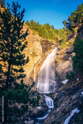 Ardones waterfall landscape of the village of Cerler  in the Benasque Valley. Huesca. Pyrenees. Spain.