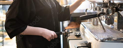 Barista Precisely Adjusting a Professional Espresso Machine at a Busy Cafe during rush hour