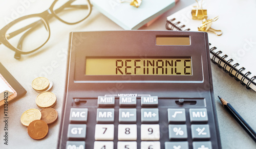 A calculator displaying the word refinance on its screen.
