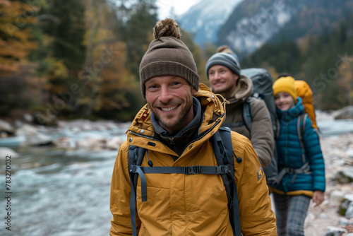 A family hiking in nature together enjoys an outdoor adventure.