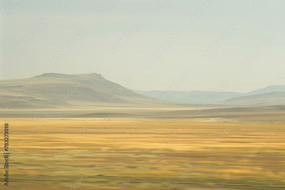 A vast, empty plain stretches out before you. The only thing that breaks the monotony is a lone mountain in the distance. The sky is a clear blue, and the sun is shining brightly. A vast, empty plain stretches out before you. The only thing that breaks the monotony is a lone mountain in the distance. The sky is a clear blue, and the sun is shining brightly.