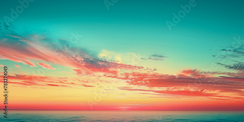 Vibrant Sunset Sky with Pastel Clouds Over Ocean Horizon