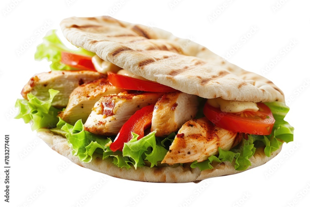 A delicious chicken pita sandwich with fresh lettuce and juicy tomatoes. Perfect for food blogs or restaurant menus A delicious chicken pita sandwich with fresh lettuce and juicy tomatoes. Perfect for food blogs or restaurant menus