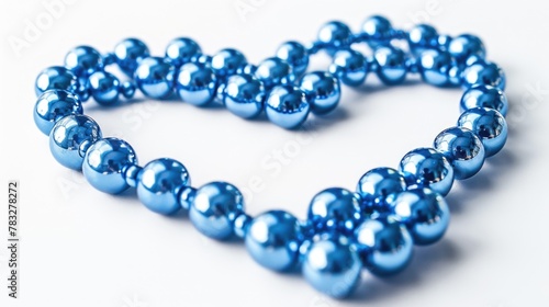 Heart made out of blue beads, perfect for romantic concepts and love themes