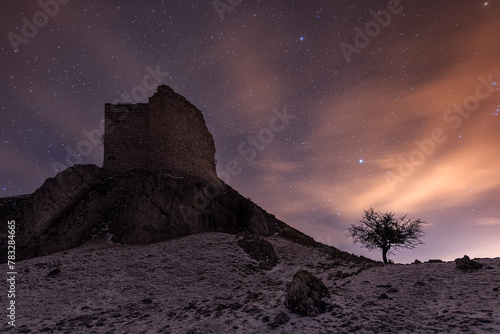 Night view of the ruins of the medieval castle of Monasterio de Rodilla, Burgos, in the region of La Bureba, declared a site of cultural interest and historical heritage of Spain photo