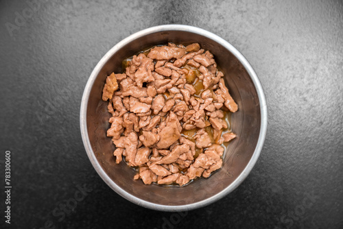 Food for animals background. wet cat and dog food texture, pattern. Pet meal background close up. wet food for pet dogs and cats. Dried pet food top view. Granules of good nutrition for dogs and cats.