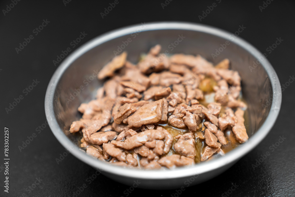 Food for animals background. wet cat and dog food texture, pattern. Pet meal background close up. wet food for pet dogs and cats. Dried pet food top view. Granules of good nutrition for dogs and cats. Food for animals background. wet cat and dog food texture, pattern. Pet meal background close up. wet food for pet dogs and cats. Dried pet food top view. Granules of good nutrition for dogs and cats.