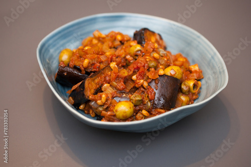 An Italian dish called Caponata with aubergines and pine nuts