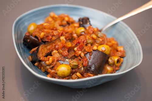 An Italian dish called Caponata with aubergines and pine nuts