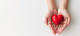 Woman hands holding red heart supporting blood donation to save life concept, isolated on white background.
