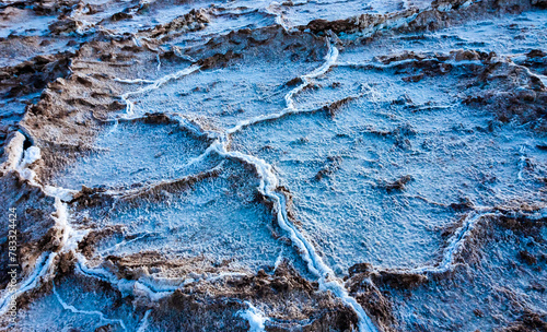 Salt plateau of self-sedimented salt cracked in the heat of the sun in the desert in Death Valley, Death Valley National Park, California