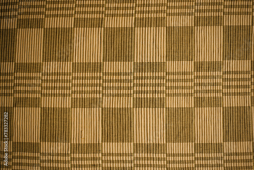 homespun yellow fabric with squares, texture