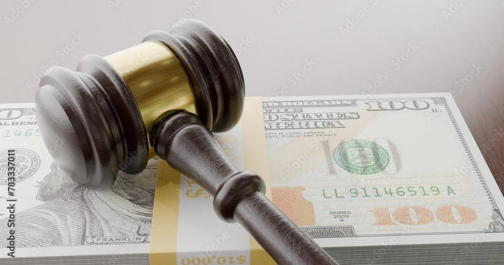Slow Pan and Zoom of Law Gavel and Stack of One Hundred Dollar Bills on Desk.
Slow Pan and Zoom of Law Gavel and Stack of One Hundred Dollar Bills on Desk.