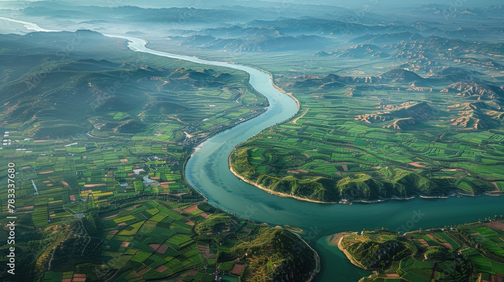 River Flowing Through Lush Green Countryside