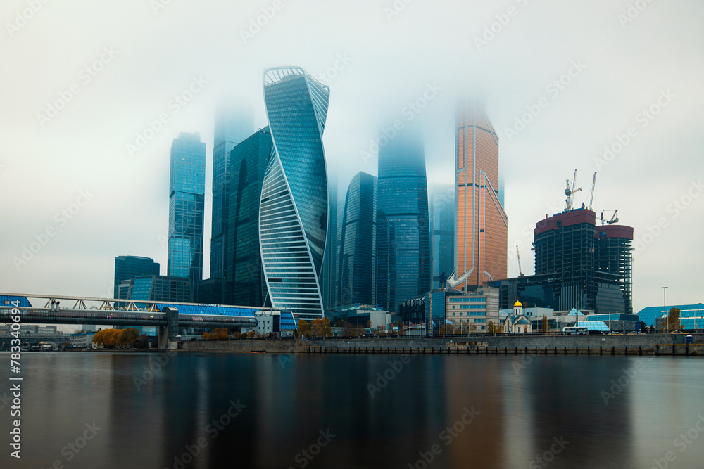 Moscow, Russia - November 3, 20209: Heights in the fog. Buildings of the business center Moscow City in a cityscape.