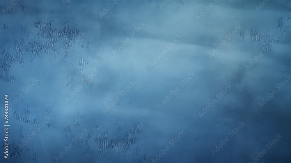 Denim blue color. A serene image of a blue textured sky that fades into abstract patterns suitable for backgrounds or design elements. 