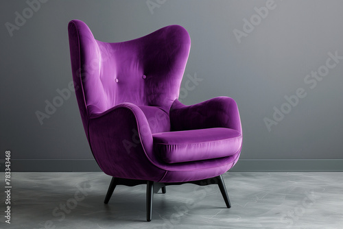 purple comforable armchair on grey background, contemporary relaxation furniture (1) photo