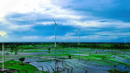 Aerial view of a wind-powered power plant that stops rotating after heavy rain photo