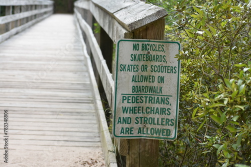 wooden boardwalk sign prohibited items
