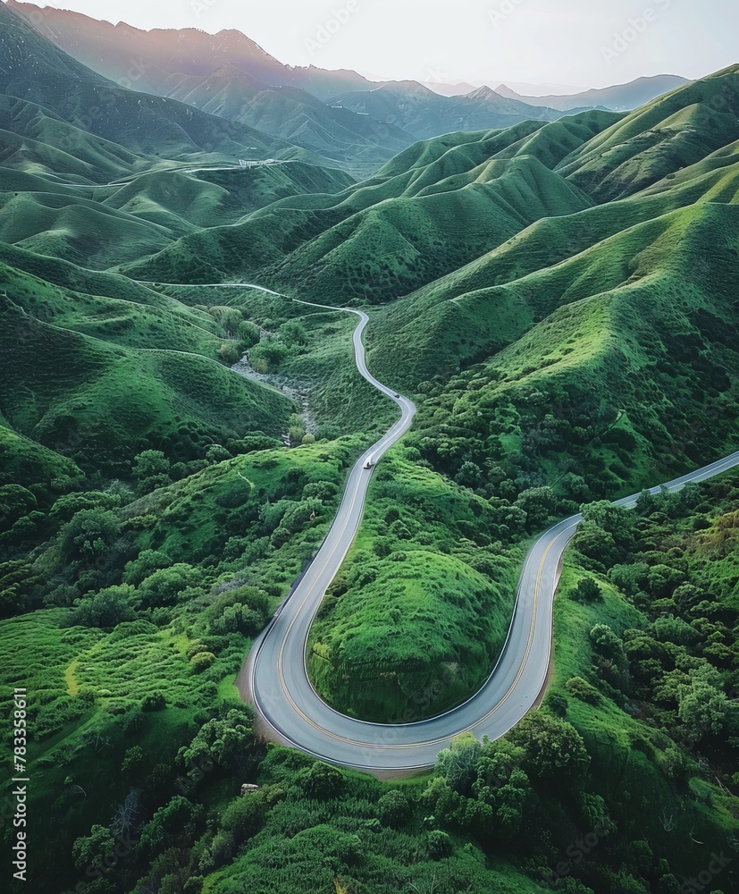 Aerial view of a winding road in the mountains Aerial view of a winding road in the mountains