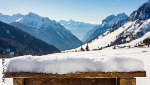 board cover of snow with frost and blurred landscape of moutains christmas mockup background and empty space for your decoration sunny cold december day natural light and free space for your product