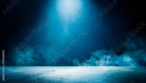 empty dark blue abstract cement wall and studio room with smoke float up the interior texture for display products wall background