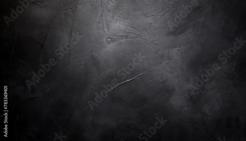 fond d un mur noir texture ciment beton ambiance sombre arriere plan pour conception et creation graphique photo