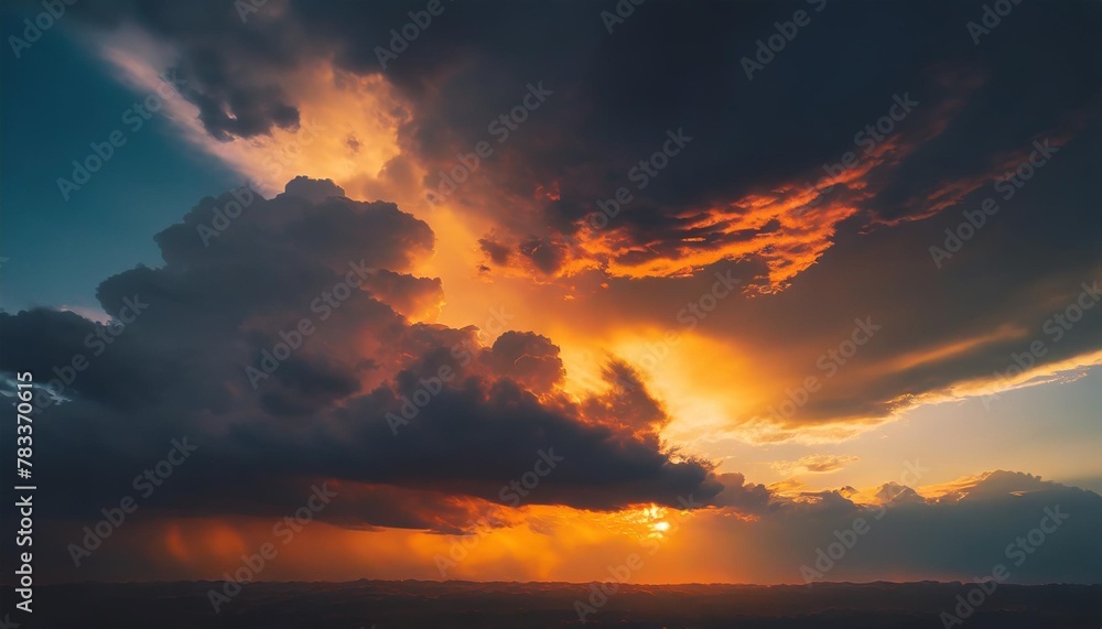 dramatic afterglow illuminating colorful sunset sky over dramatic storm clouds