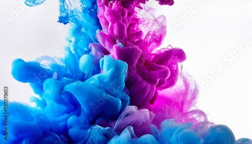 acrylic color pigment and ink cloud in water abstract smoke on white background with copy space fancy dream cloud of ink underwater purple blue and pink colors
