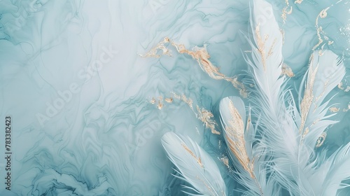 Ethereal white feathers with golden accents on a turquoise marbled background. Luxury and tranquility concept suitable for spa branding and high-end design elements photo