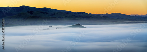 View of valley of fog, clouds with mountains, hills
