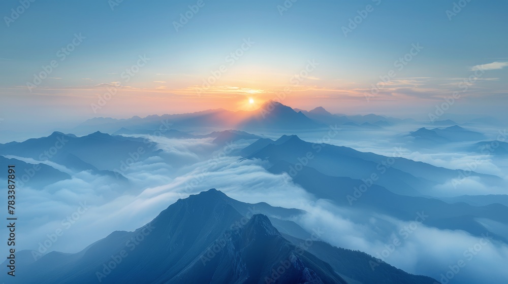 The Sun Setting Over Foggy Mountains